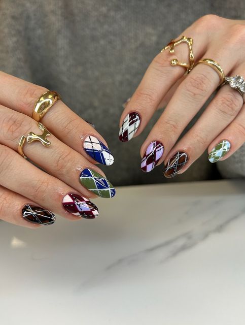 Argyle pattern nail art in deep tones